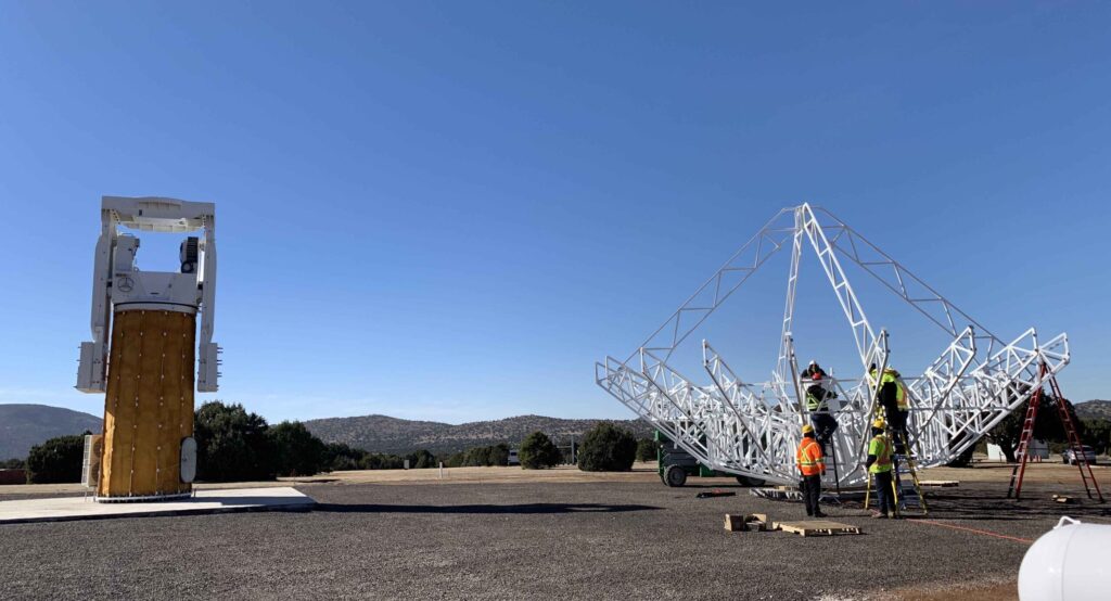 Construction and assembly of VLBI antenna tower and antenna. 